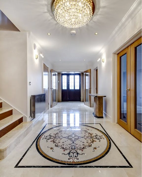 Marble & stone · Hallway floor with decorative stone inlay