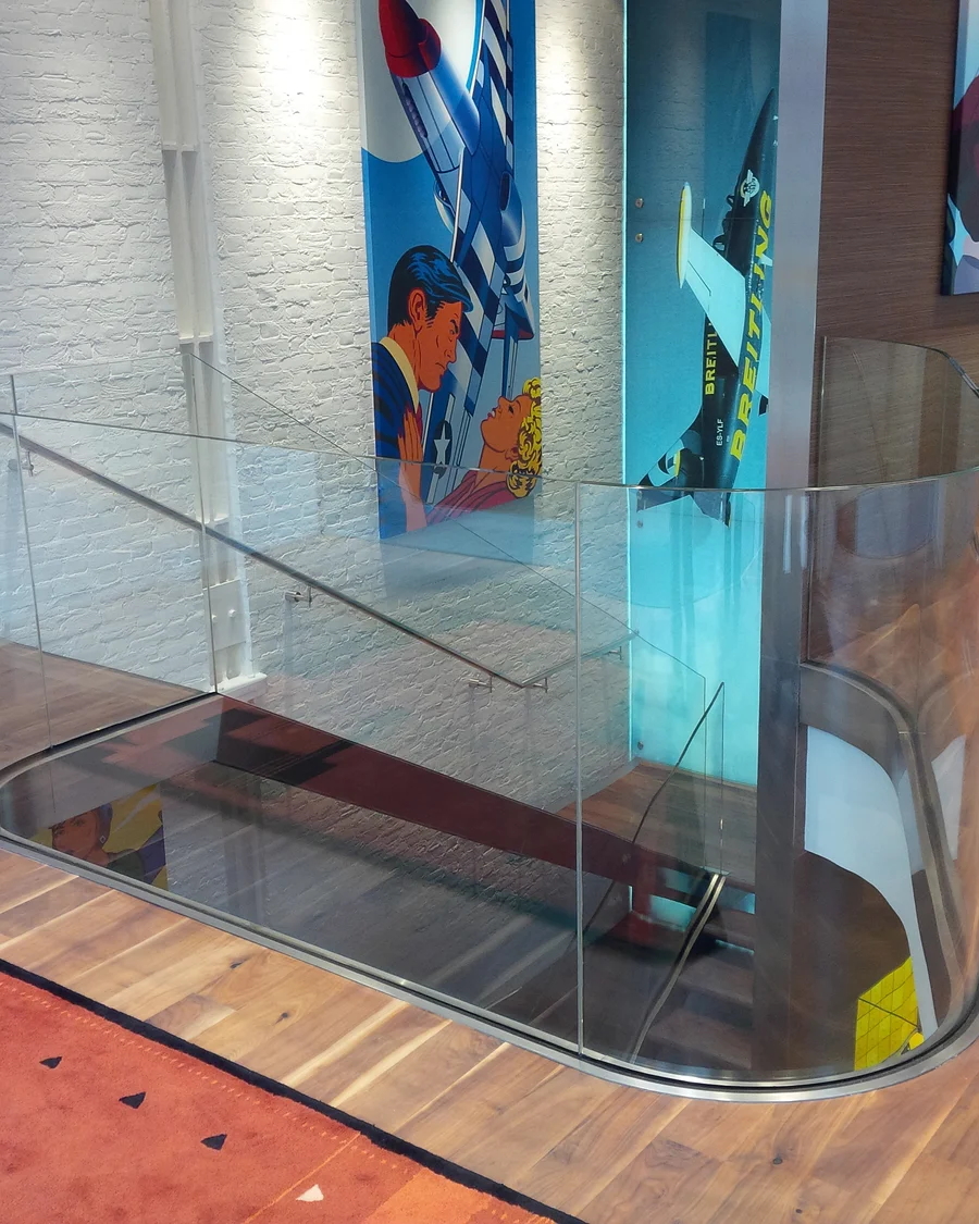 Glass details · Curved glass balustrade at a timber stair opening