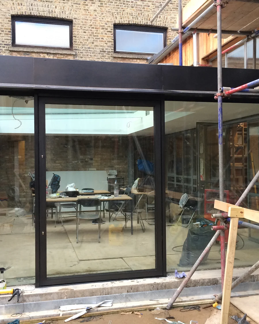 Glass details · Glazing and structural opening during works — installation photographs