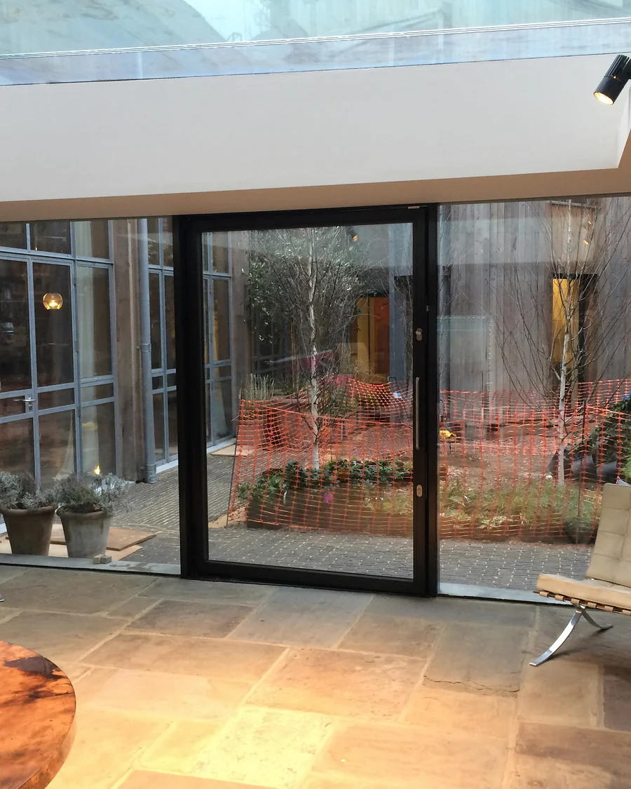 Glass details · Glazing connecting the living space and garden