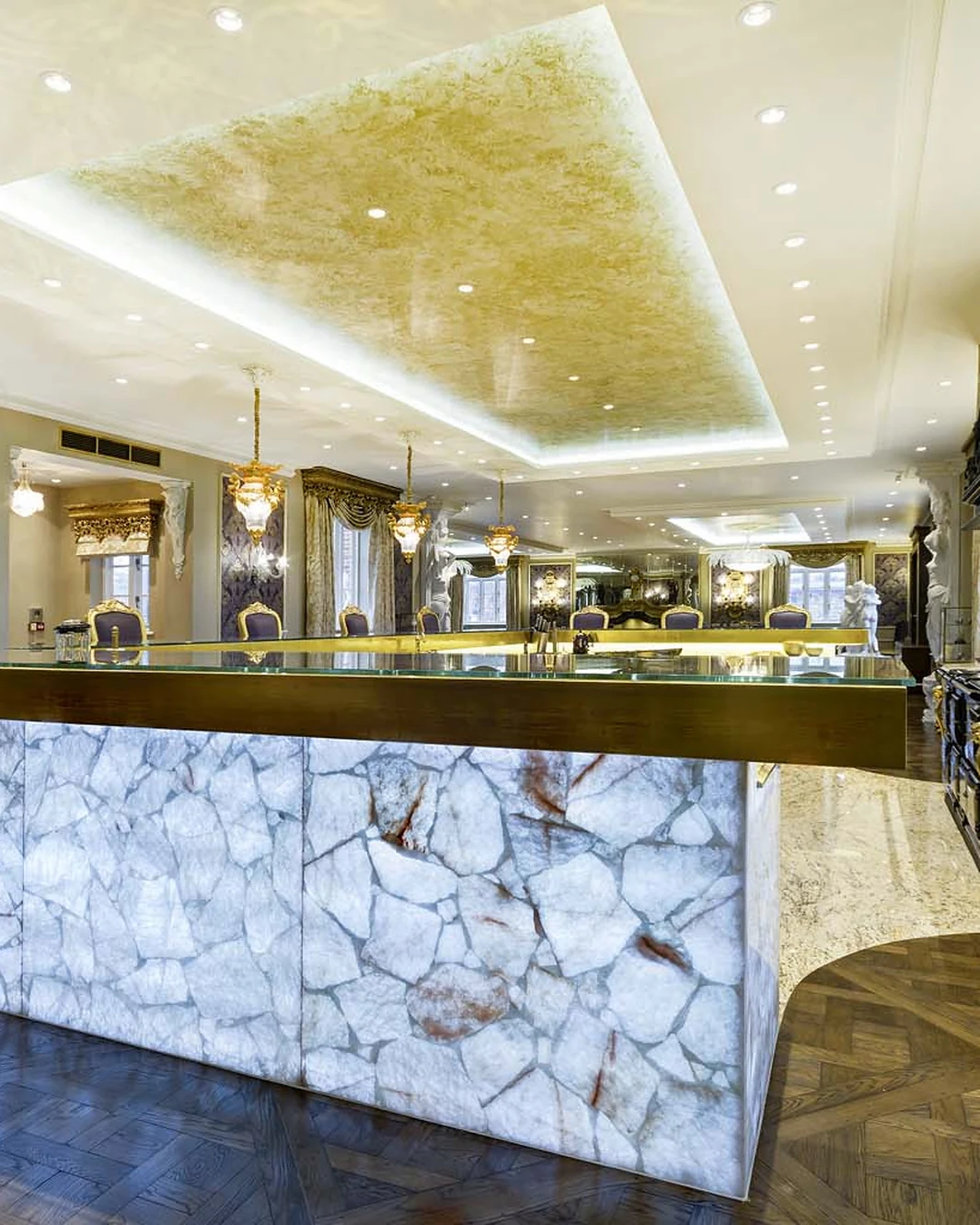 Illuminated stone facing to a kitchen island