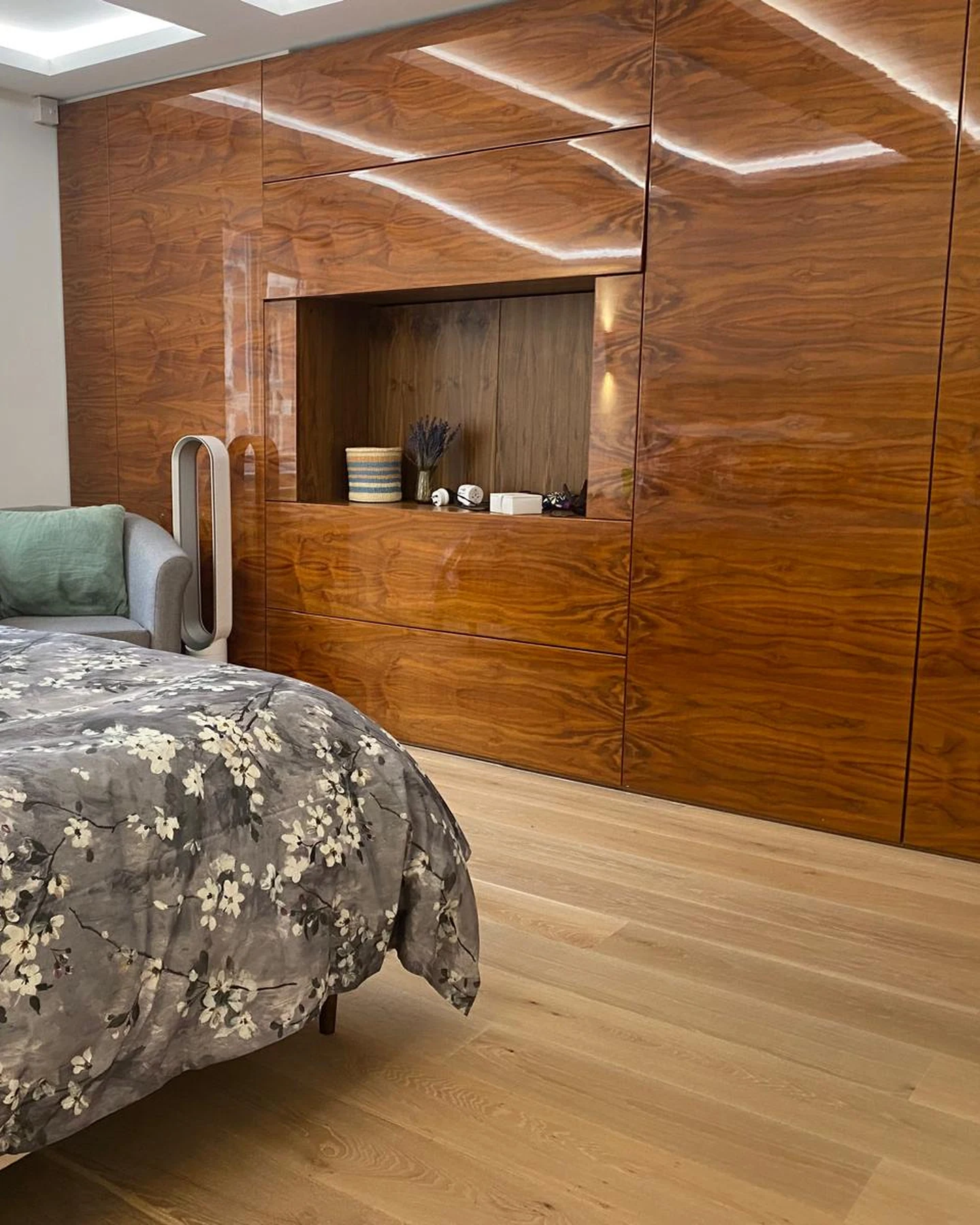 Fitted timber cabinetry and headboard in a Holborn bedroom