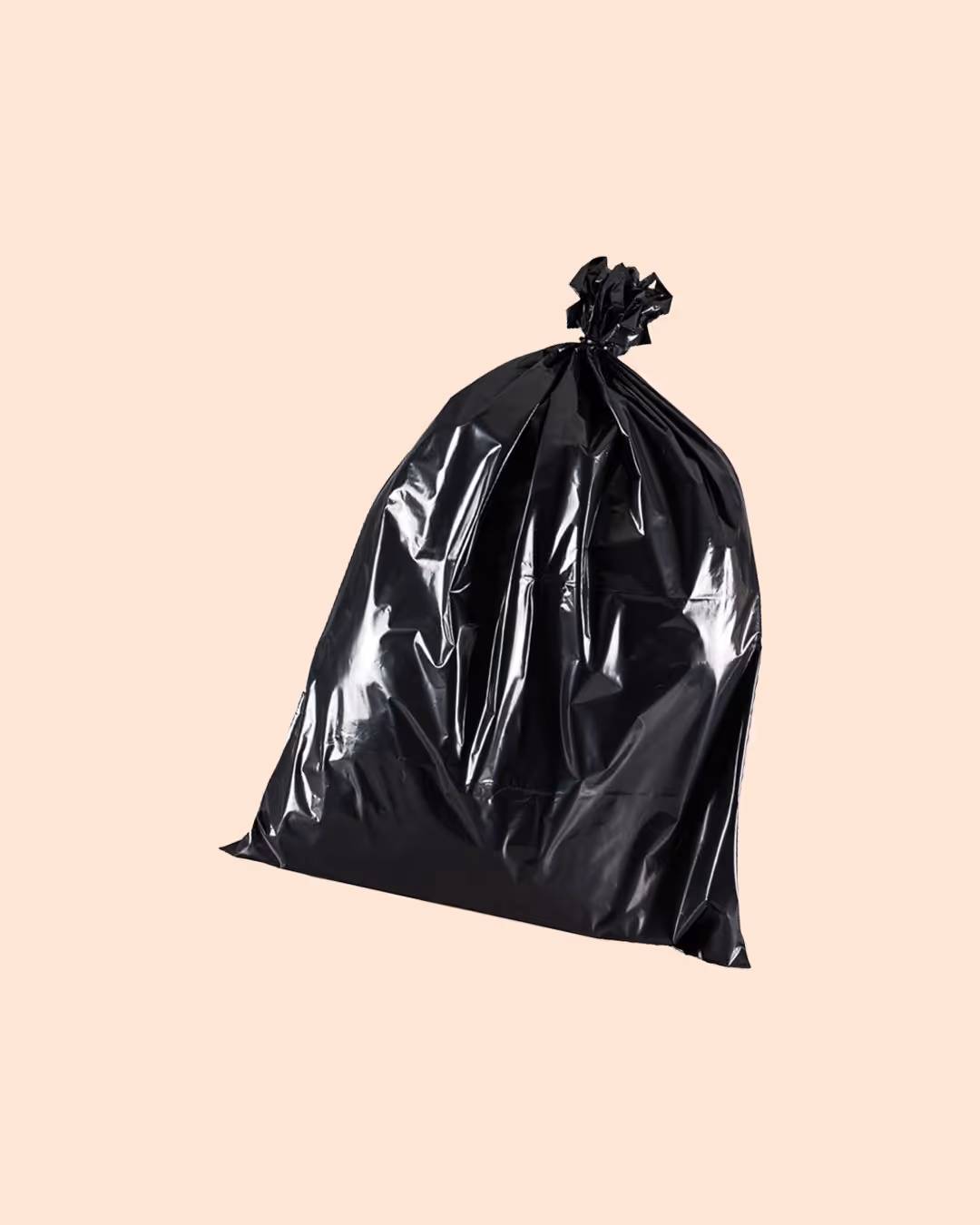 Tied black plastic garbage bag against a plain beige background.