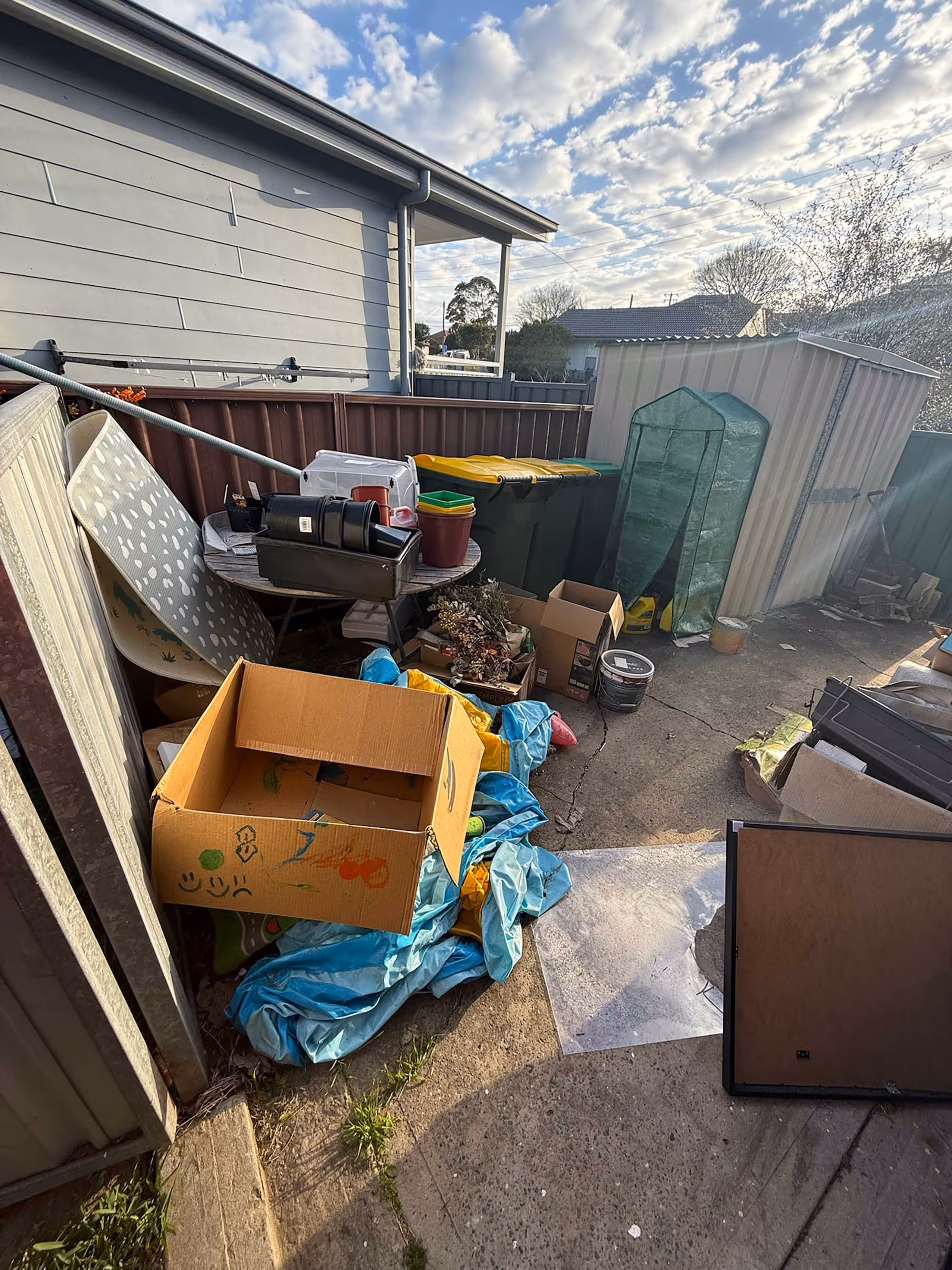 messy junk filled property