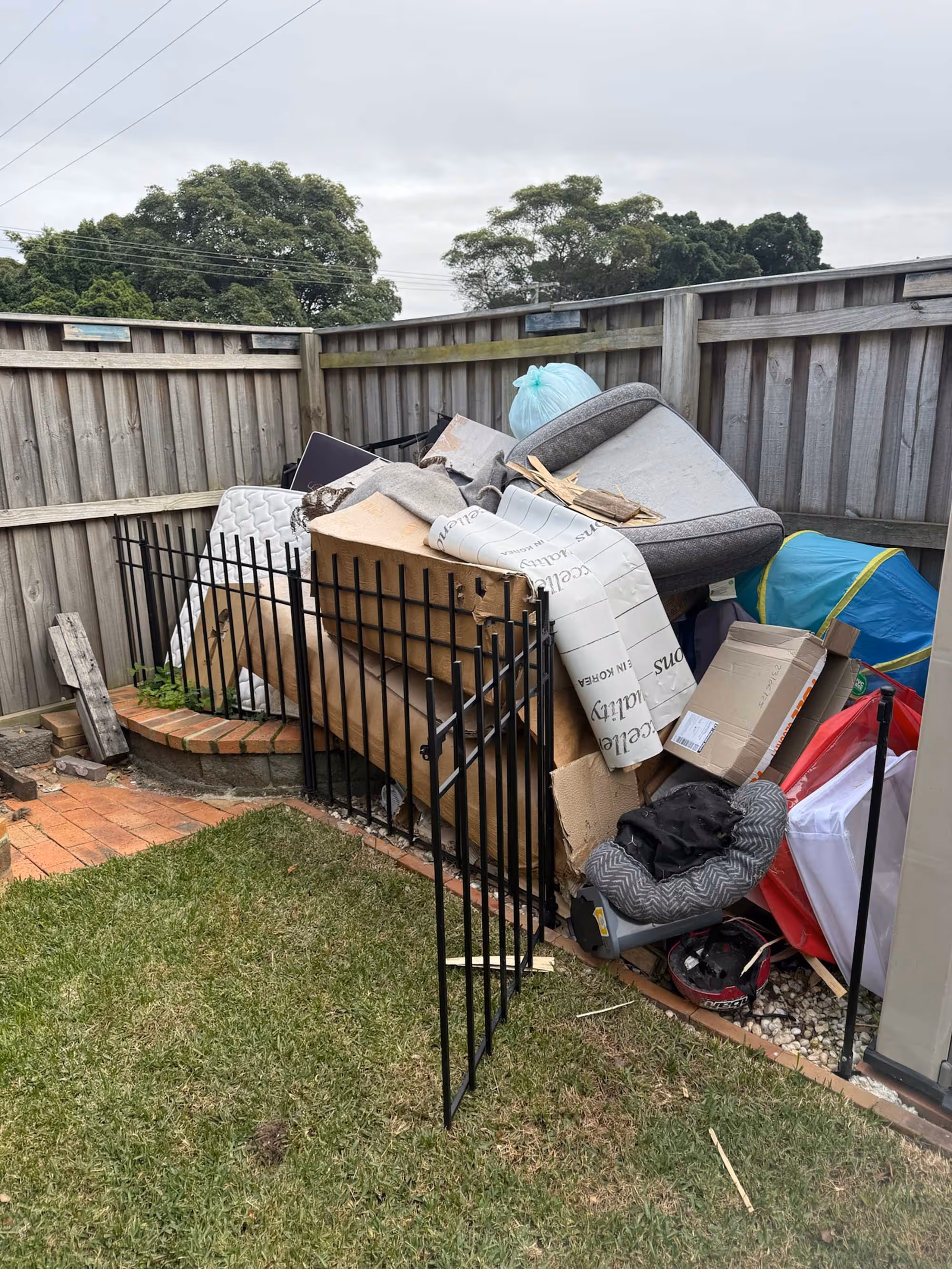 messy junk filled garden