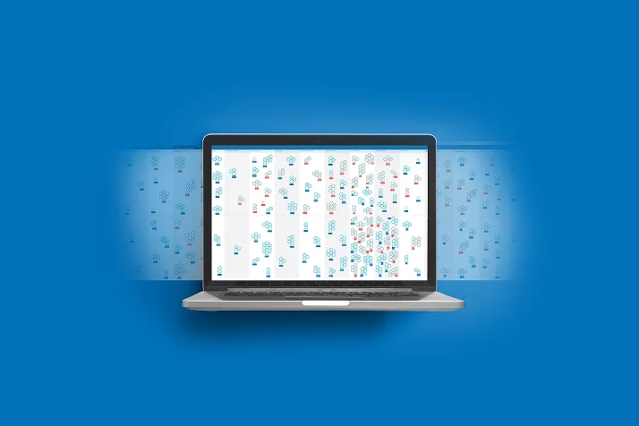 Open laptop on blue background displaying a complex digital map with interconnected blue and red icons.
