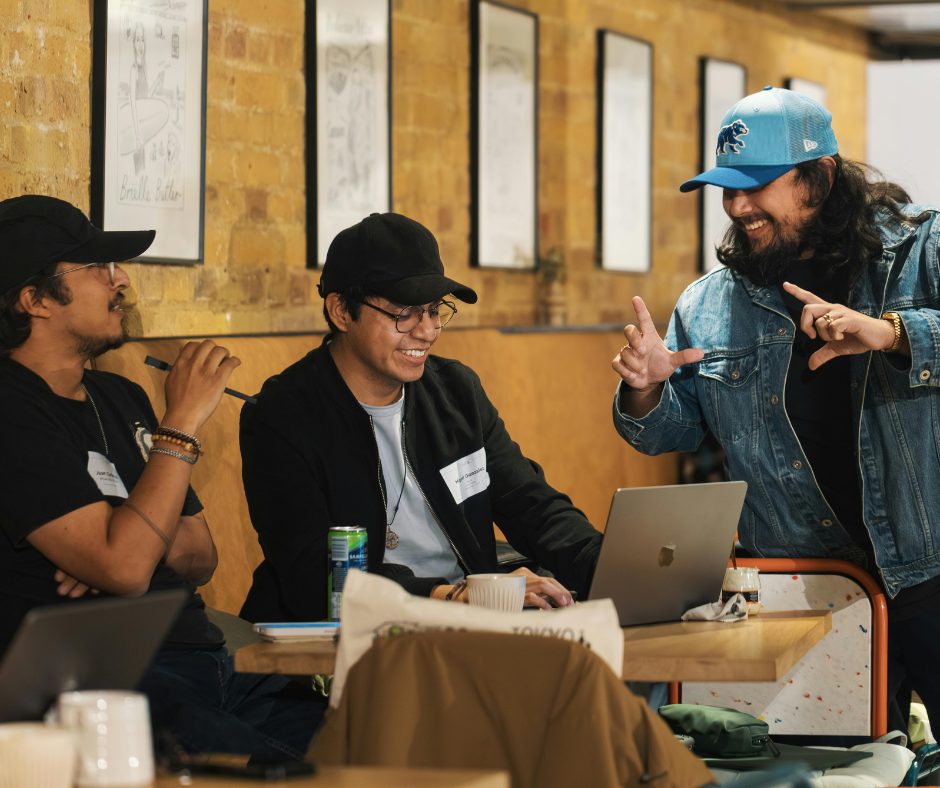 image of a diverse group of professionals in a meeting room for a digital marketing & advertising agency