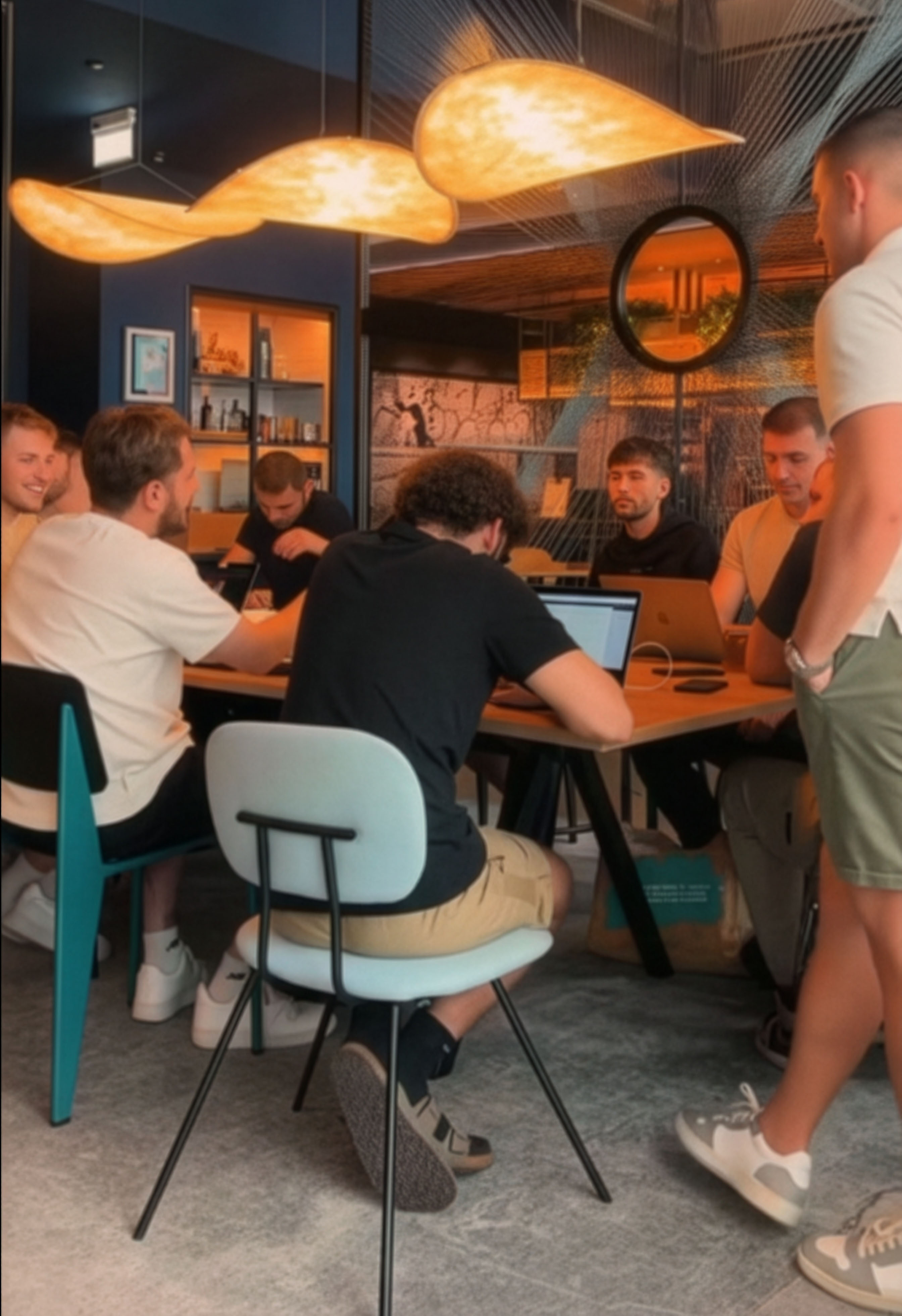 image of a diverse group of professionals in a meeting room for a digital marketing & advertising agency