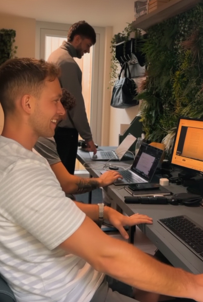 image of a diverse group of professionals in a meeting room for a digital marketing & advertising agency
