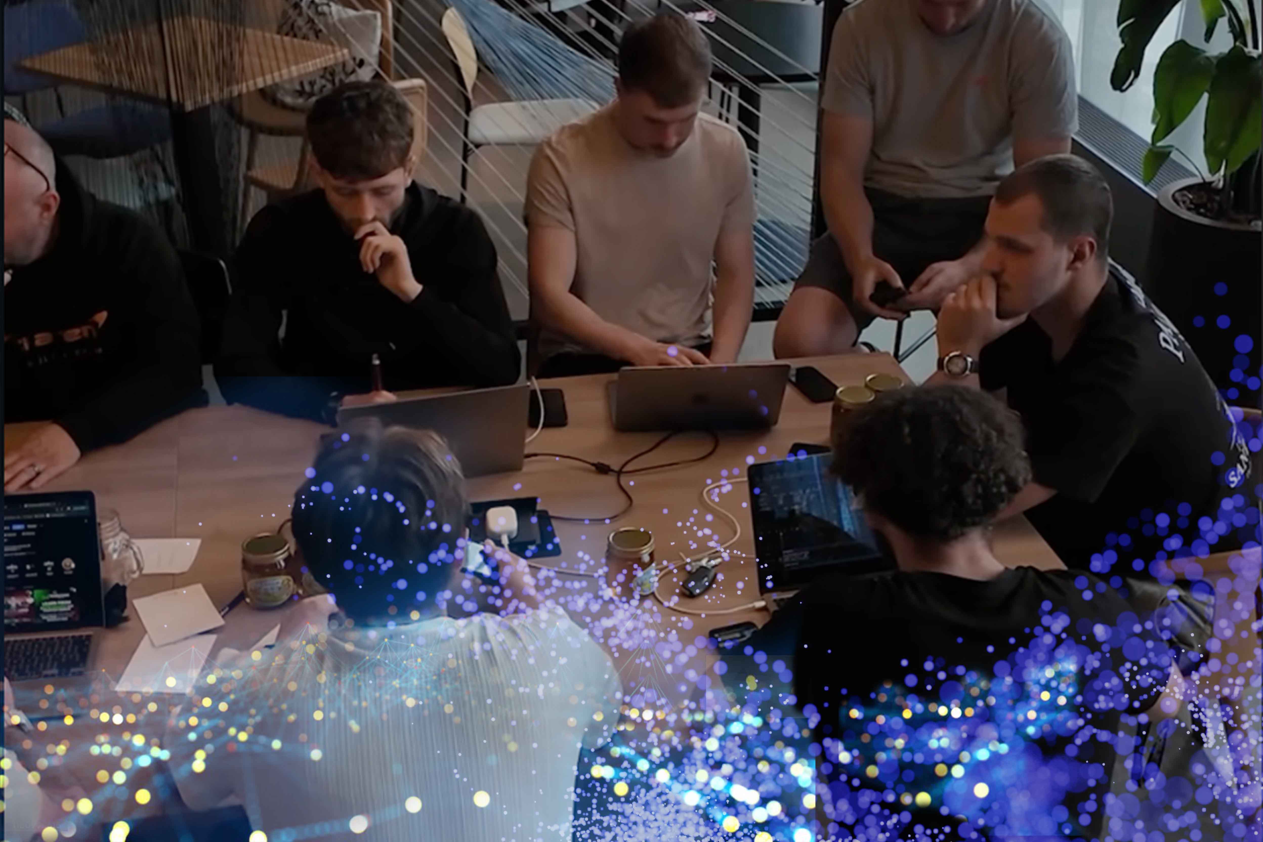 image of a diverse group of professionals in a meeting room for a digital marketing & advertising agency