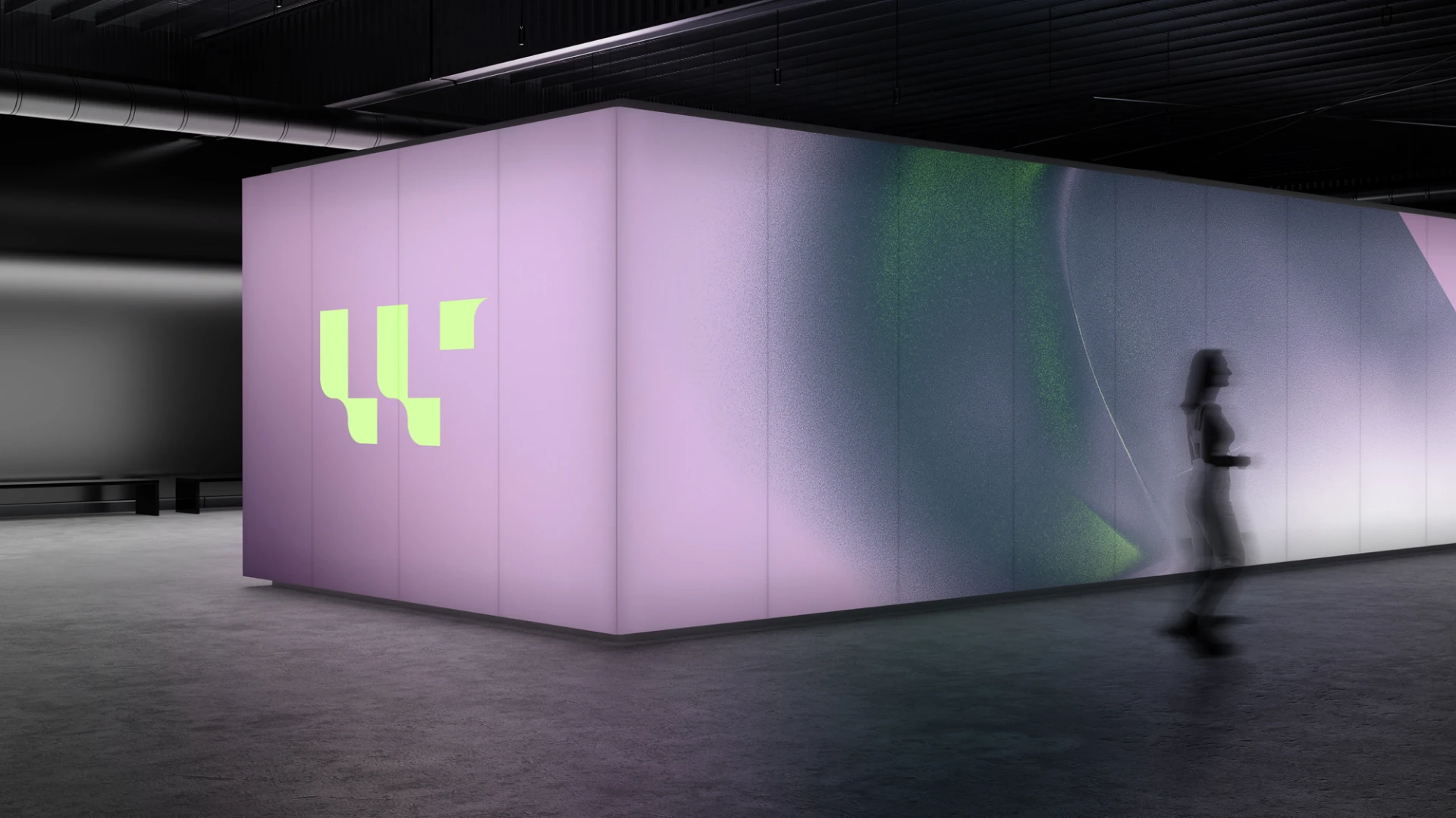 Large-scale illuminated wall installation with the CWAI logo
