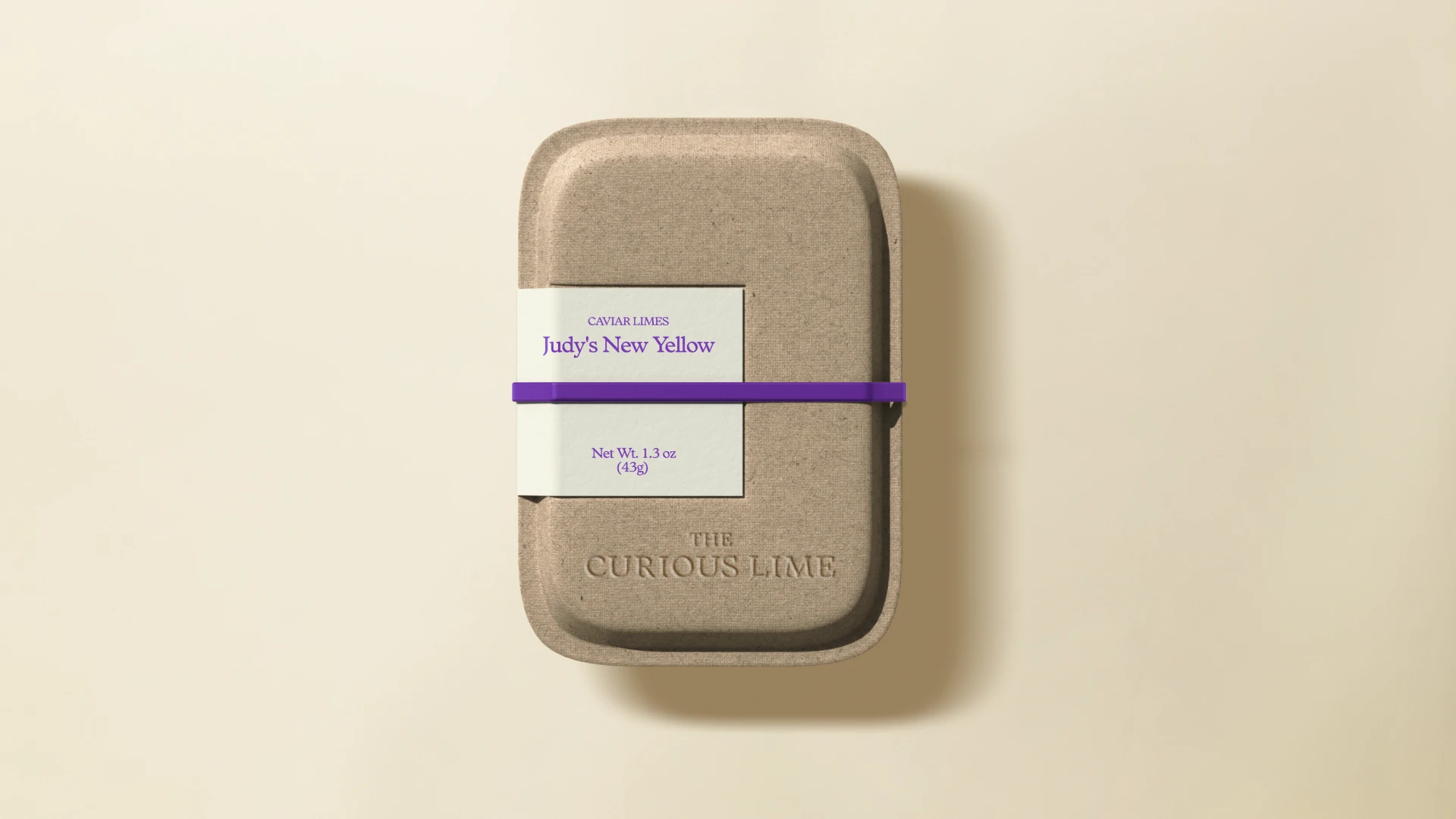 Packaging for finger limes, with brand label and stickers such as hat and plant graphics