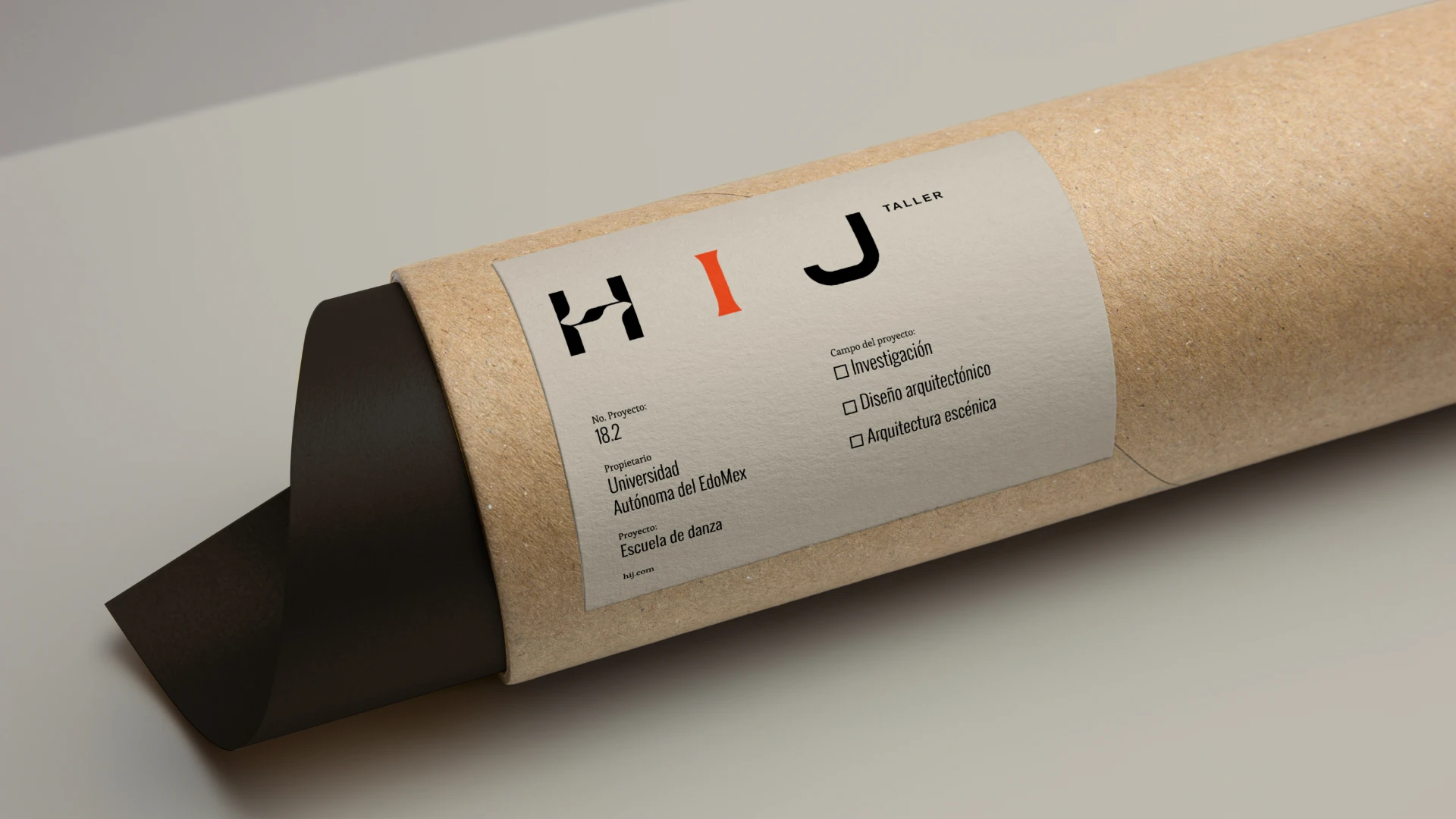A close-up of a cardboard mailing tube with a label from HIJ TALLER