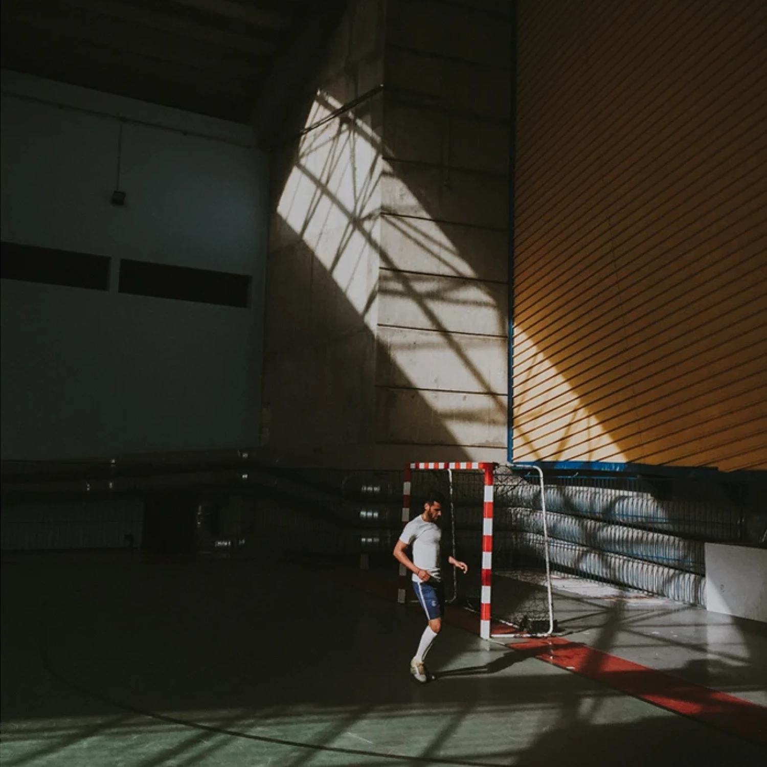 Man in an inside gymnasium training