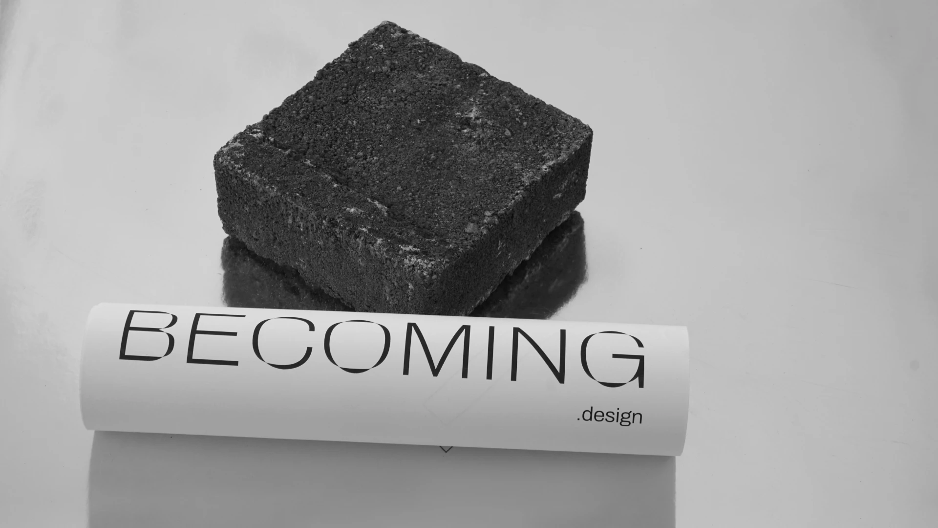 Poster design in composition with a brick
