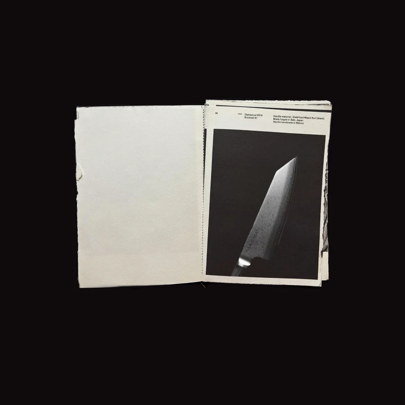 Printed media of Casa Macua with a knife photo