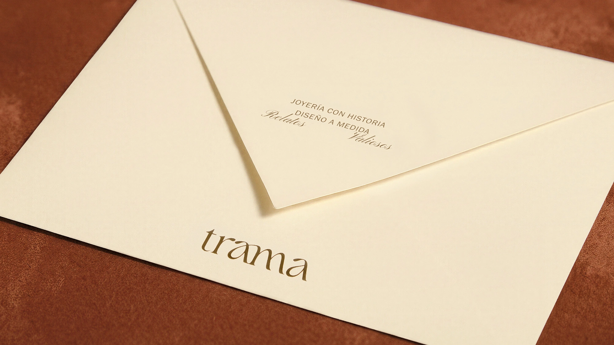 trama envelope on a orange surface