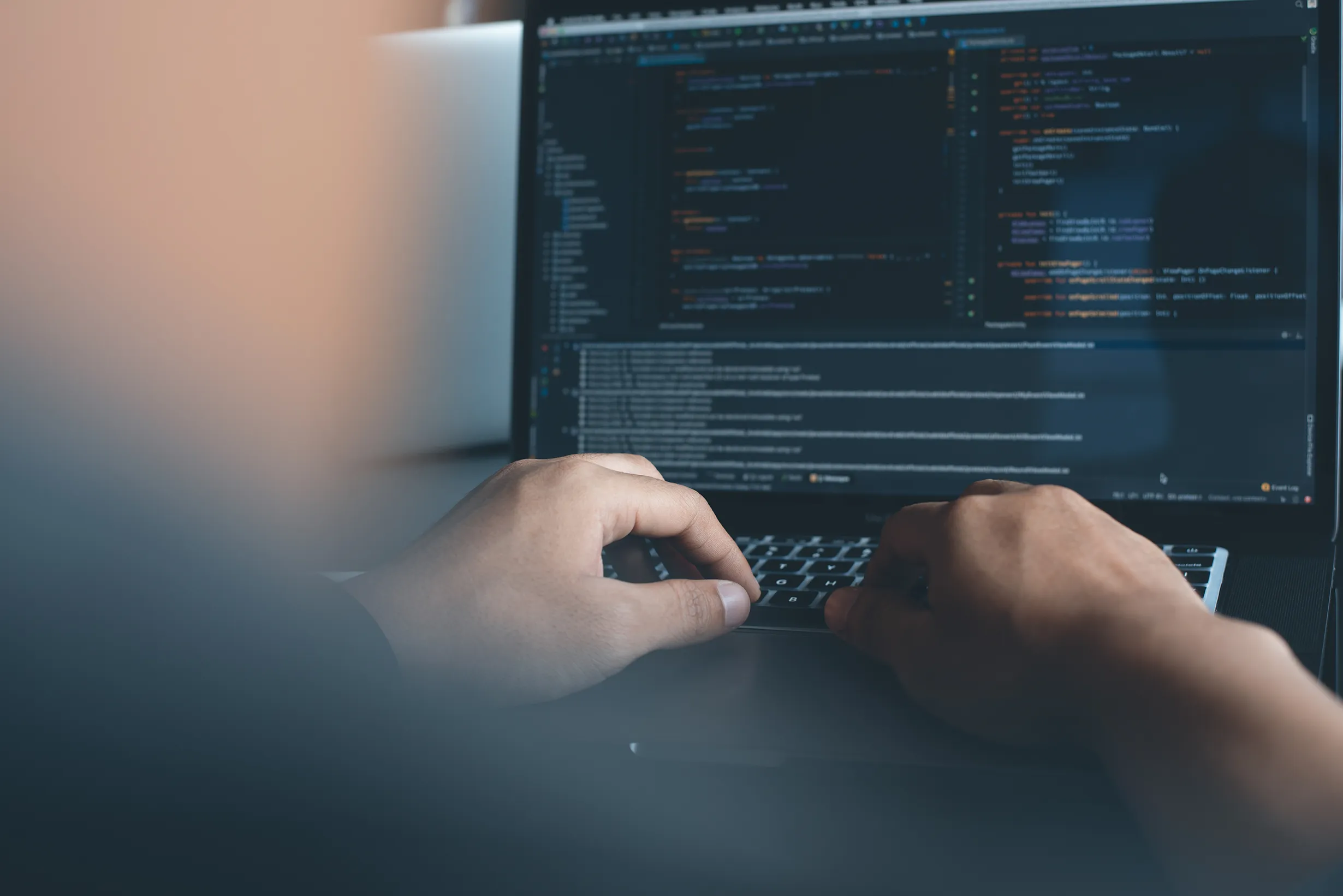 Laptop and digital workspace representing technology business insurance coverage