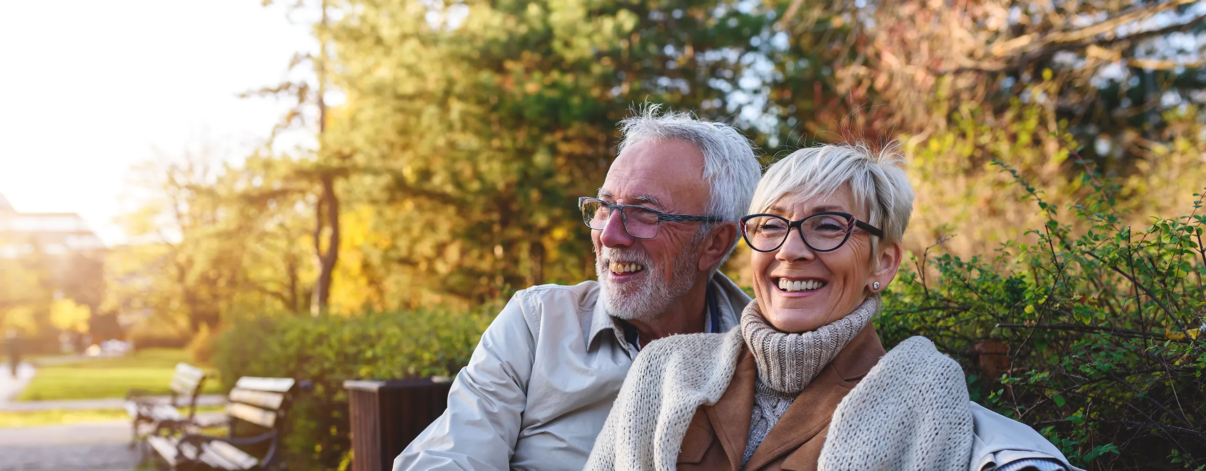 Senior couple reviewing paperwork representing Medicare insurance options