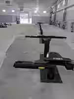 Heavy-duty frame straightening machine in a professional shop Heavy-duty frame straightening machine in a professional shop