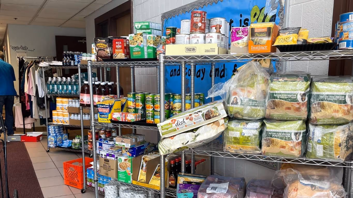 The Storehouse Pantry shelves are stocked for the event with nonperishable food, pet, and personal care items