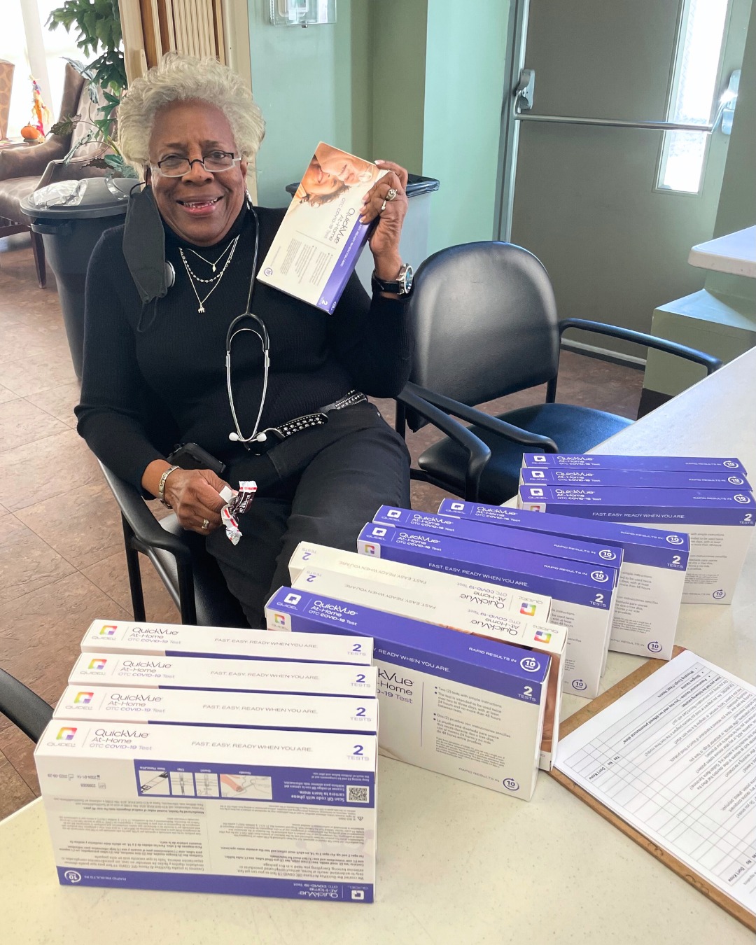 Nurse Barb passes out COVID tests at an event