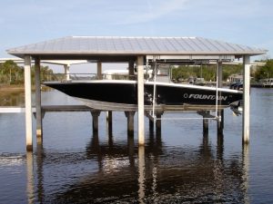 A boathouse lift with a metal roof.