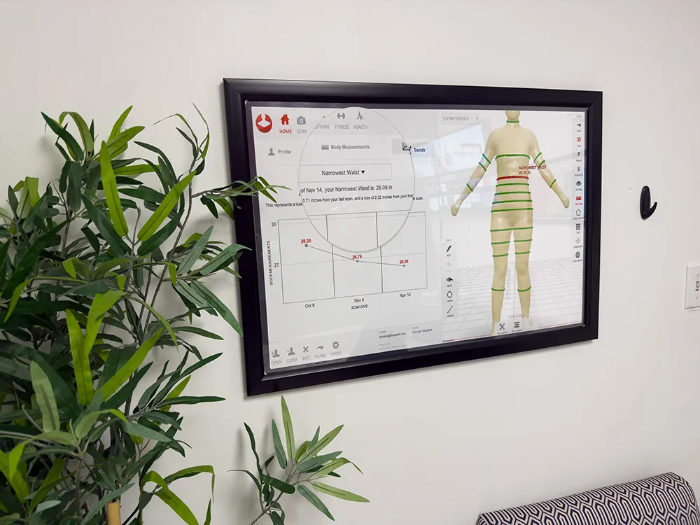 picture of a styku scan hanging on a wall