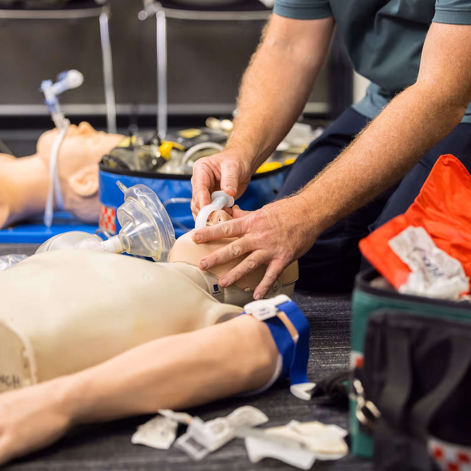 IPC trainers demonstrating emergency response procedures to a group of paramedic students