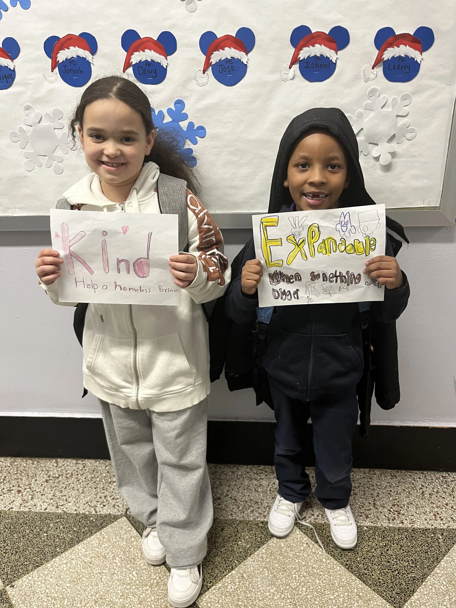 Classroom with a teacher sitting at a desk 