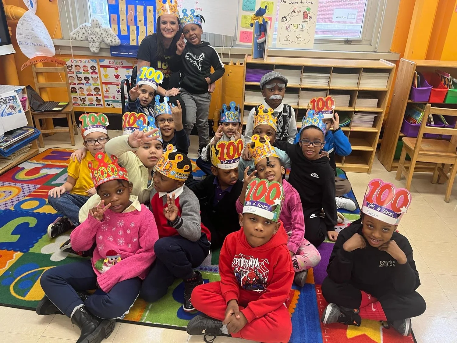 Three young children sitting 