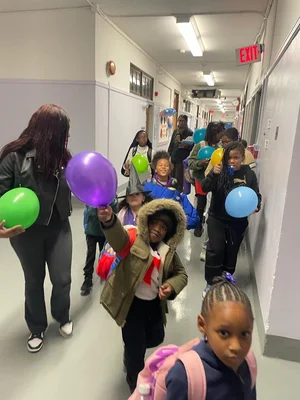 Group of children walking down 