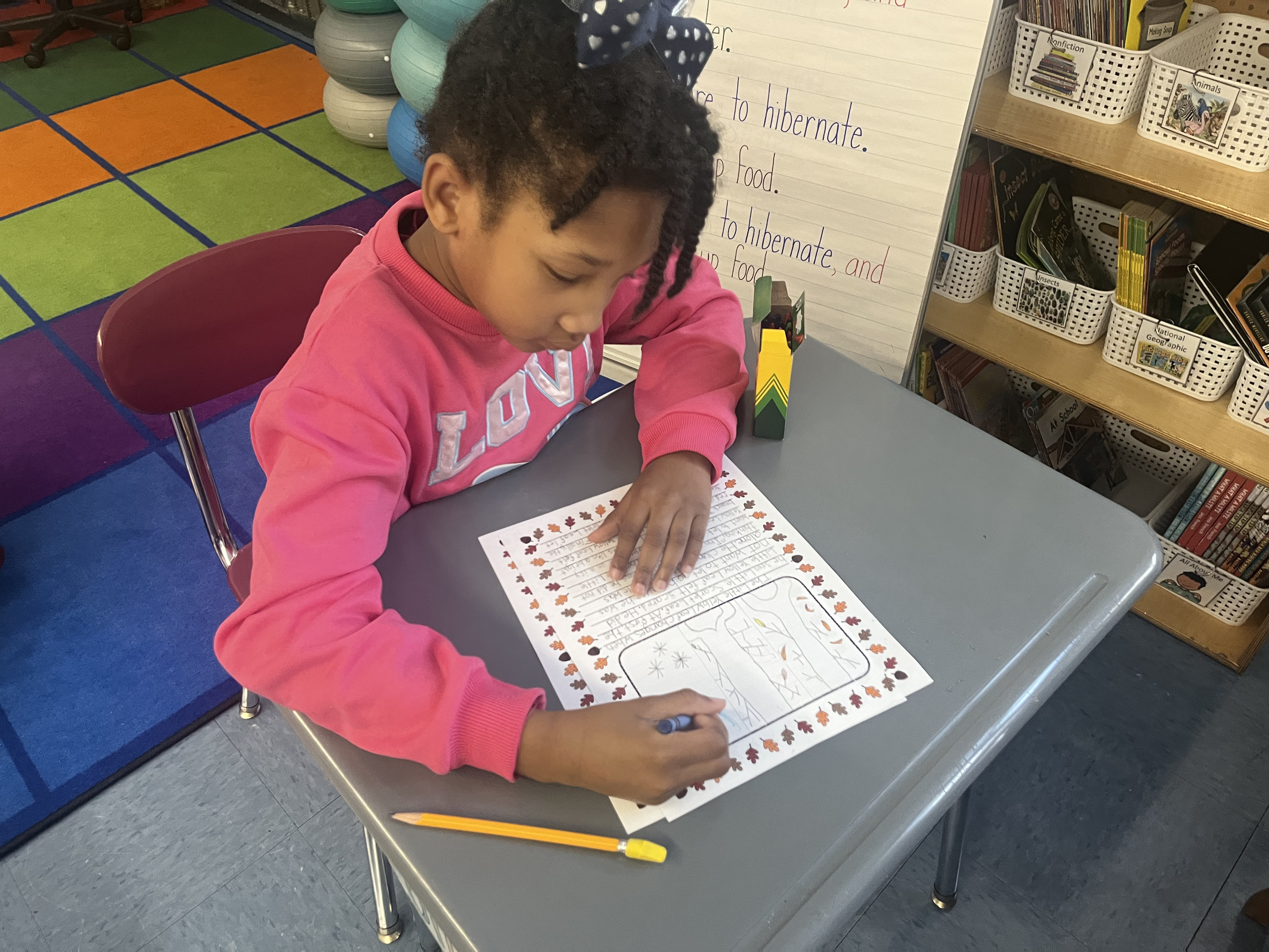 Five children standing on a polished gym floor 