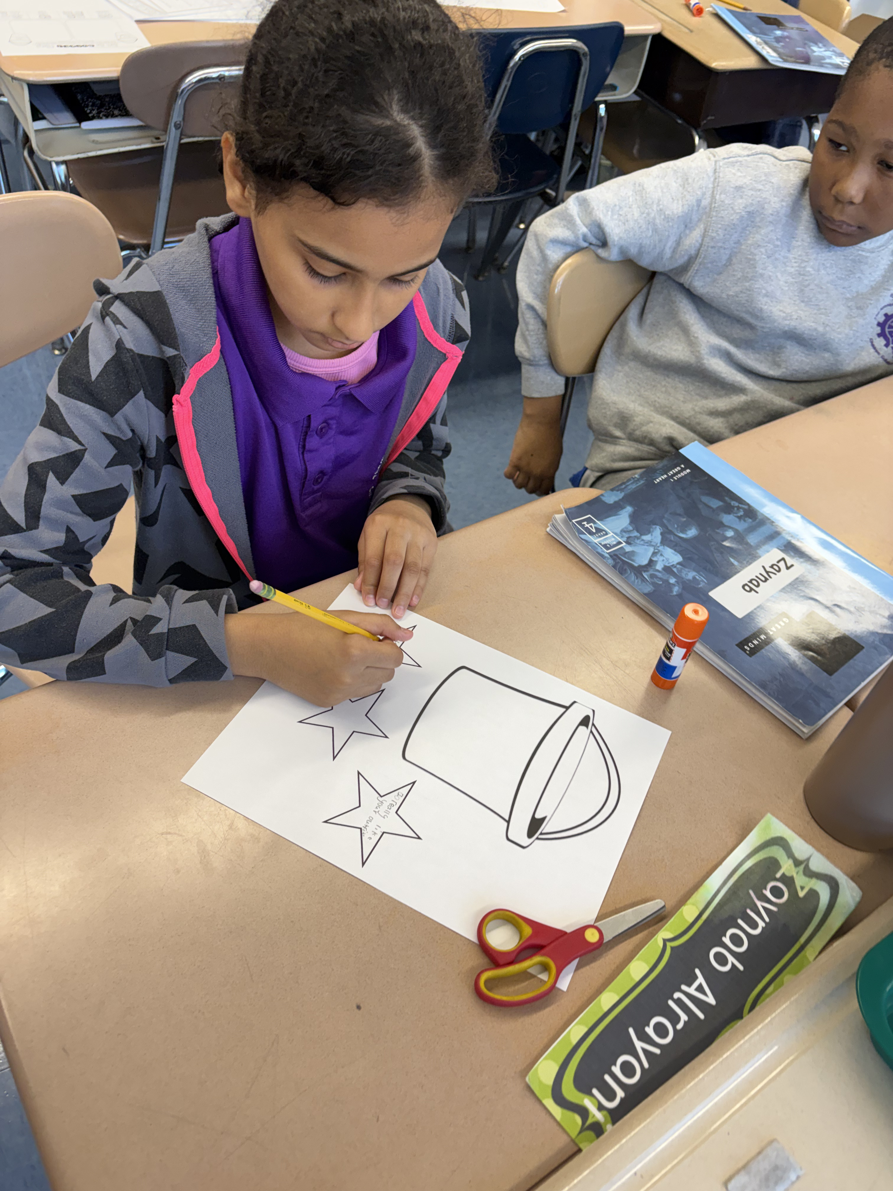 Five children standing on a polished gym floor 