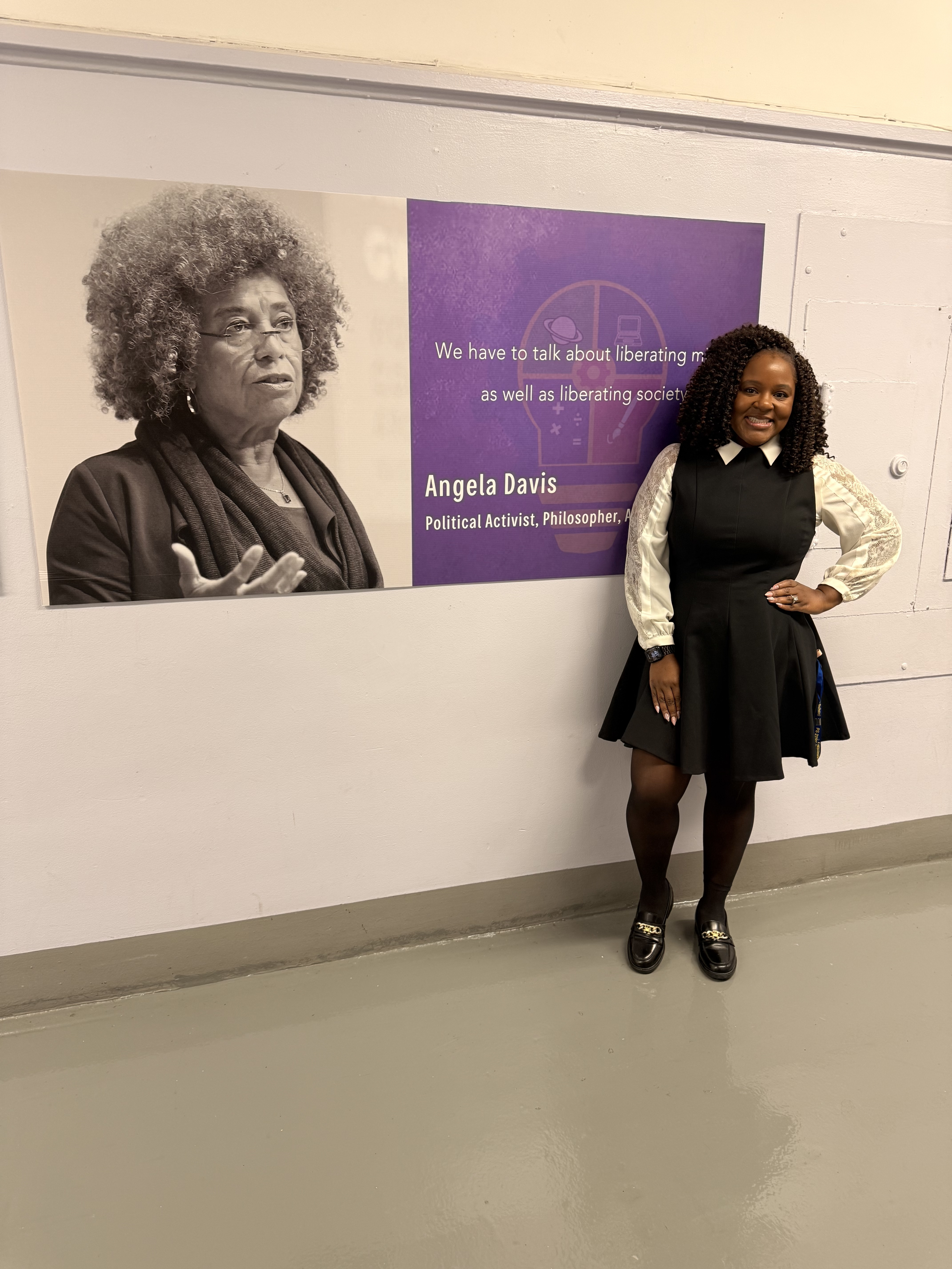 Five children standing on a polished gym floor 