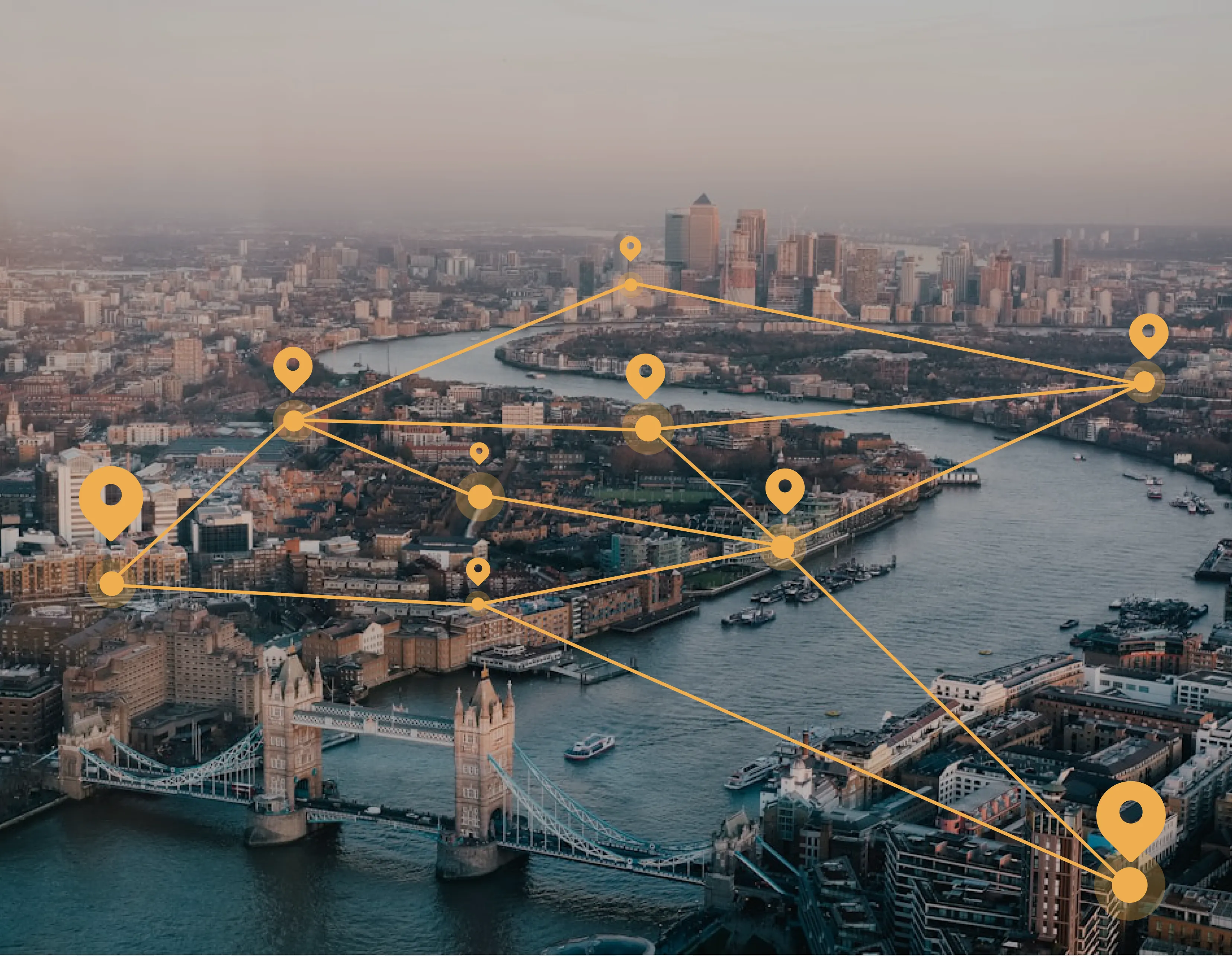 Aerial view of London with graphic lines and pinpoints showing network connections
