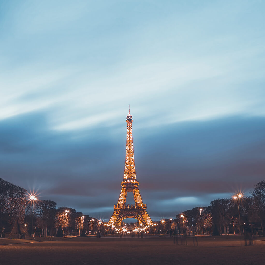 Eiffel tower lit up at night