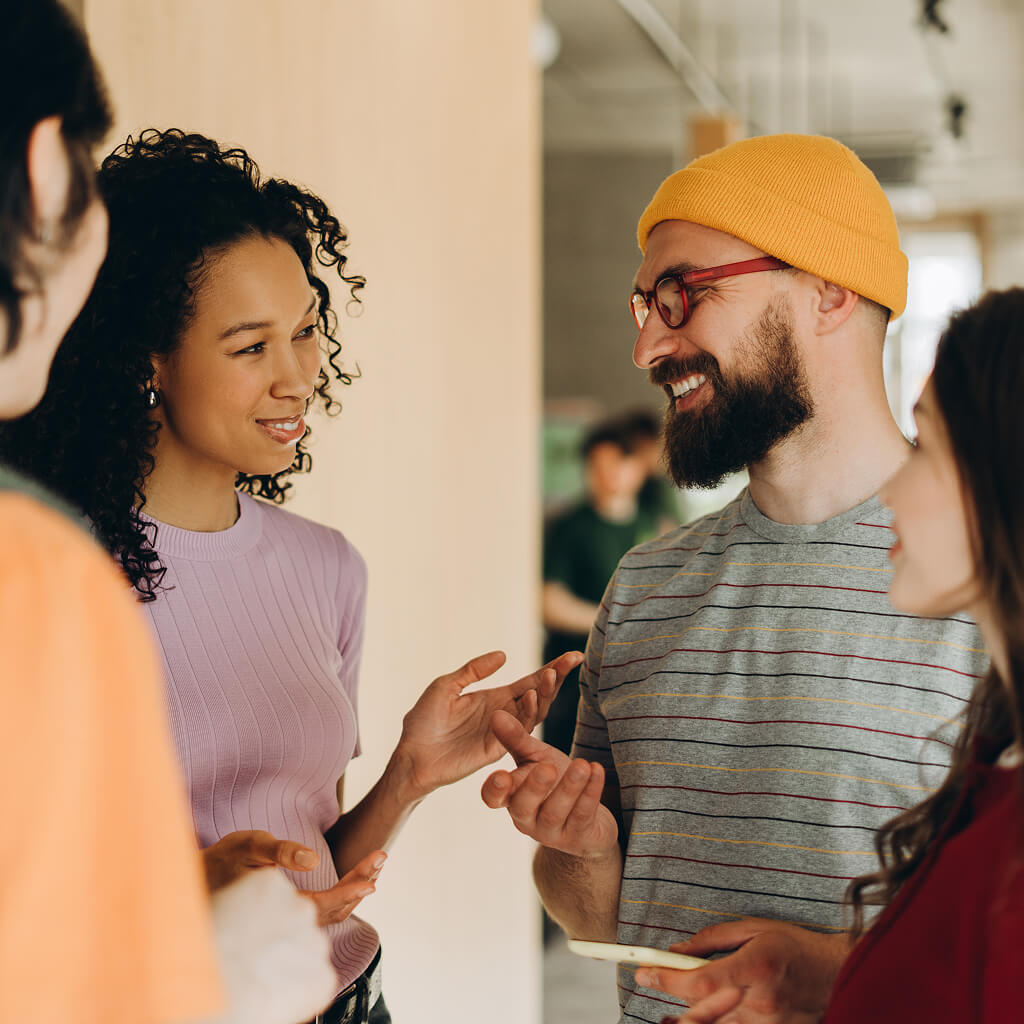 Image of man sitting working on a laptop