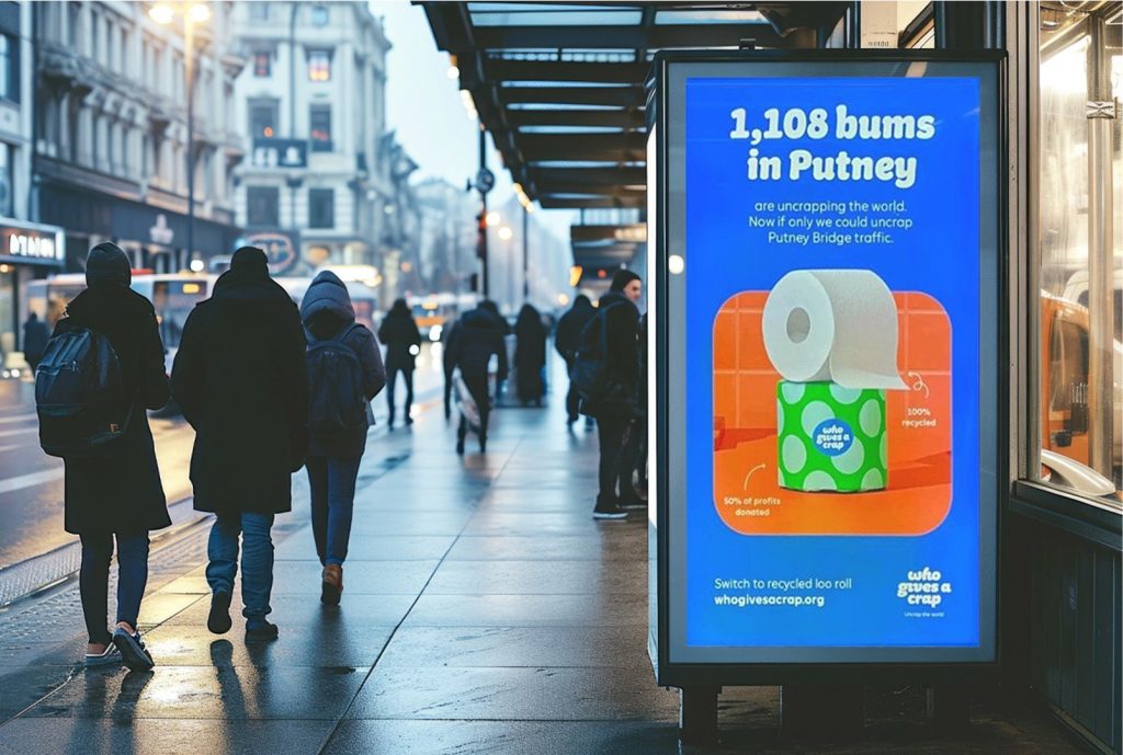 Image of man in glasses considering papers