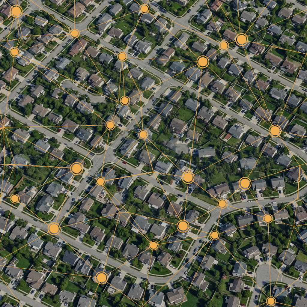 Image of a man considering something on a laptop