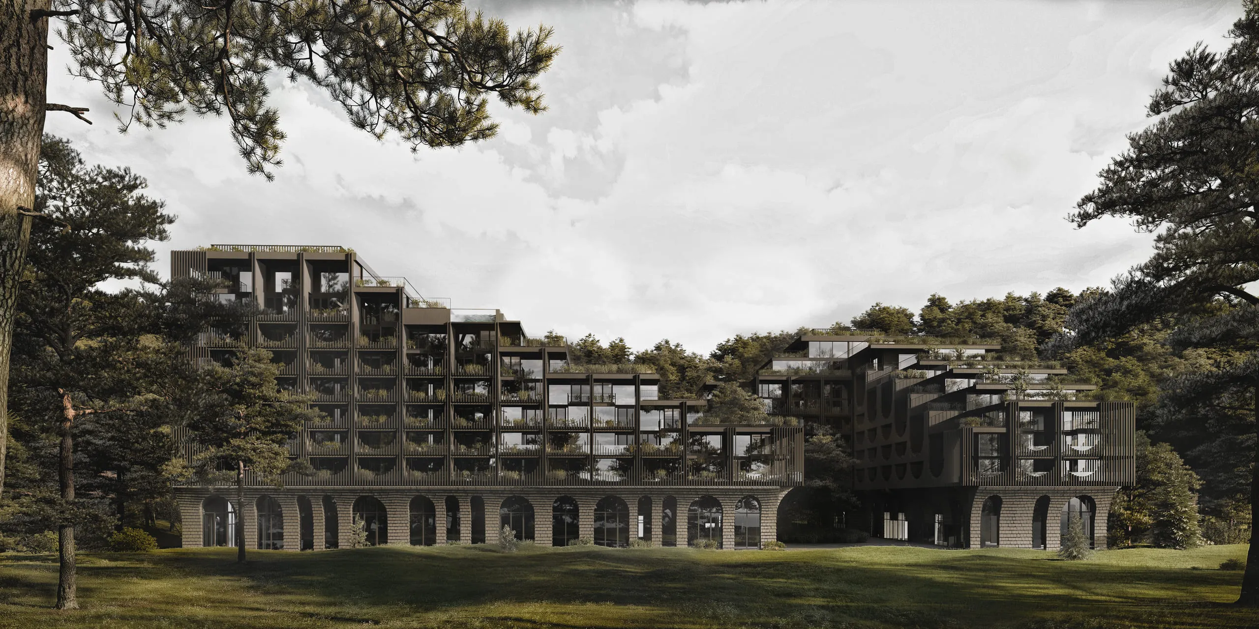 Сучасна багатоповерхова будівля з великими арками на першому поверсі та деревами на балконах, розташована серед зелених дерев і газону.