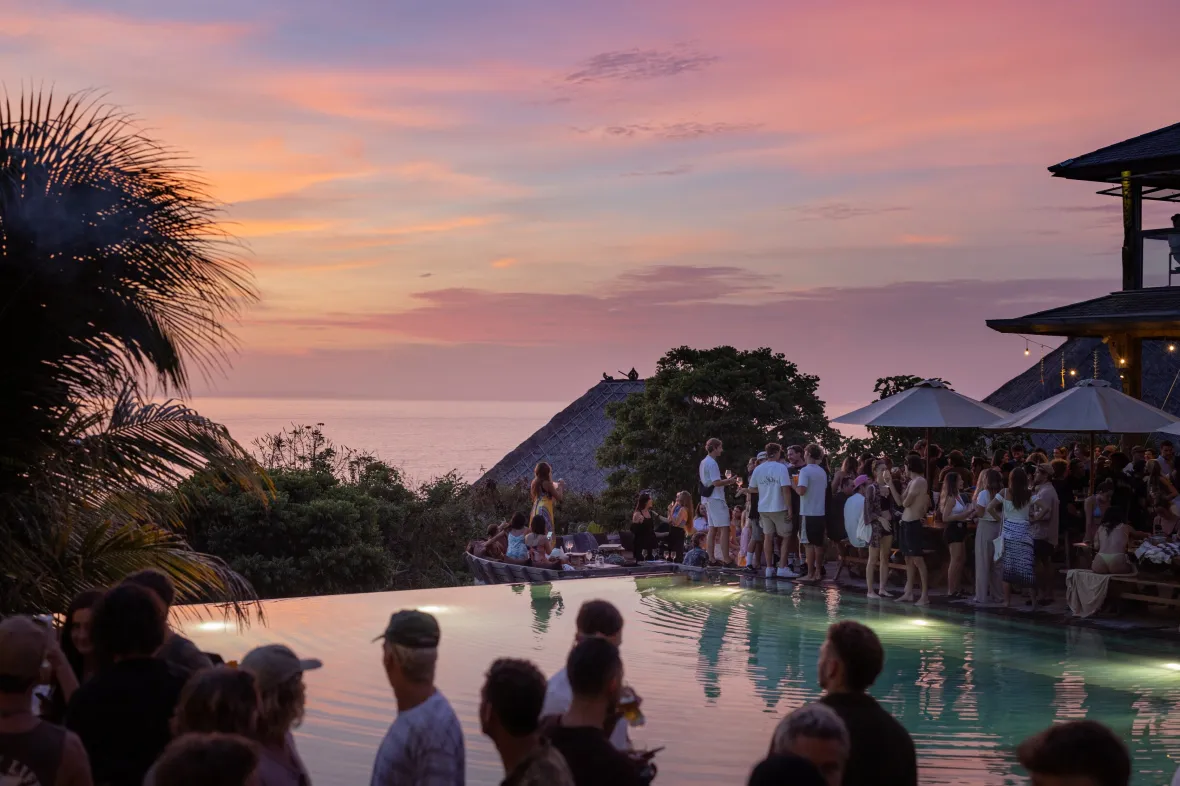 Sunset crowd with drinks at Mana, Uluwatu