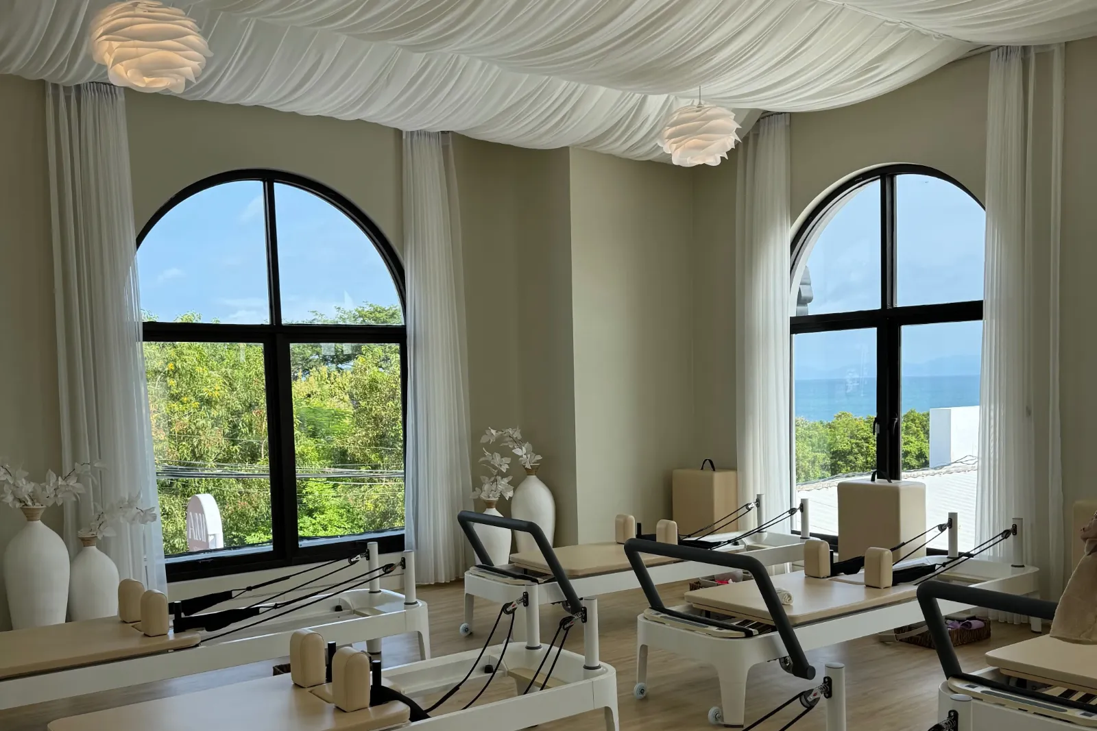 AMI Studio in Pecatu, a bright reformer and barre studio with beach views