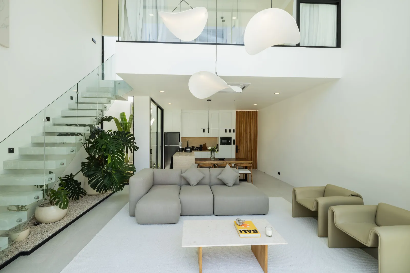 Open-plan living and dining area in a Cabo Bali managed villa
