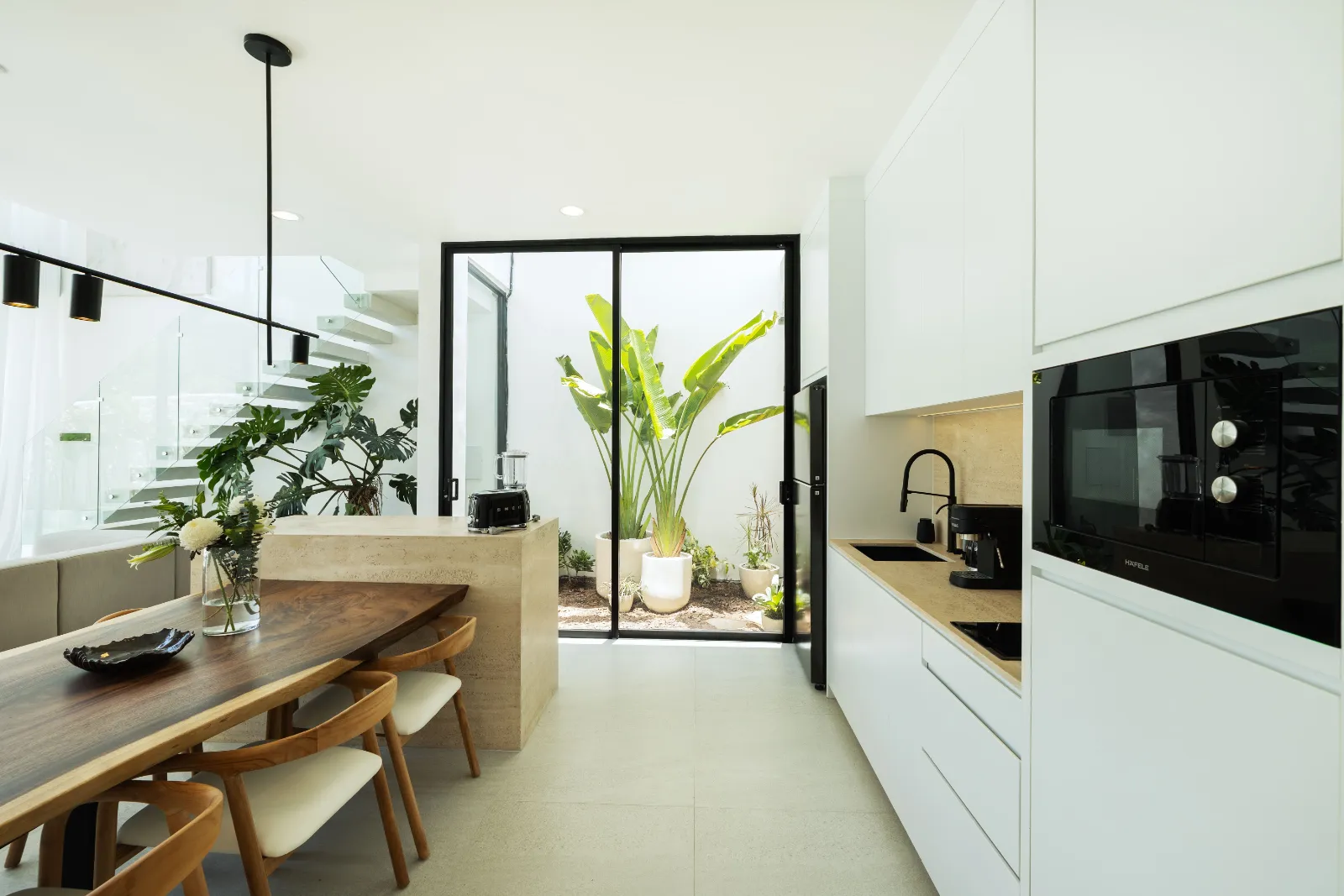 Open kitchen in a Cabo Bali villa, equipped for two-to-four-week stays