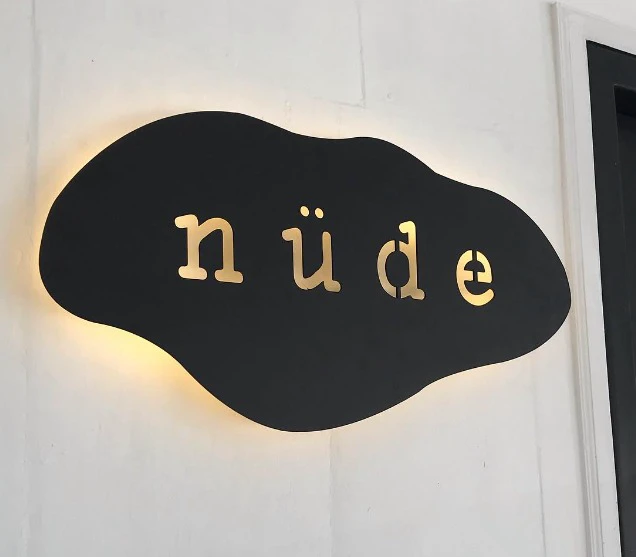 Rustic-finish dimensional letters on a Bali villa entrance wall