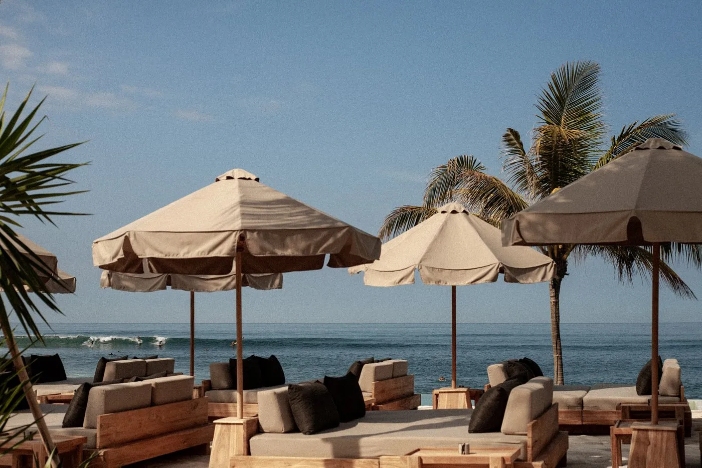 Sunset cocktails at The Lawn beach club in Canggu with ocean views