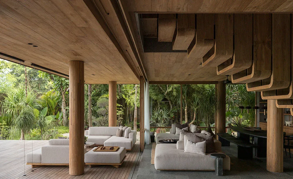 Open-sided living area in a Bali villa by Earth Lines Architects