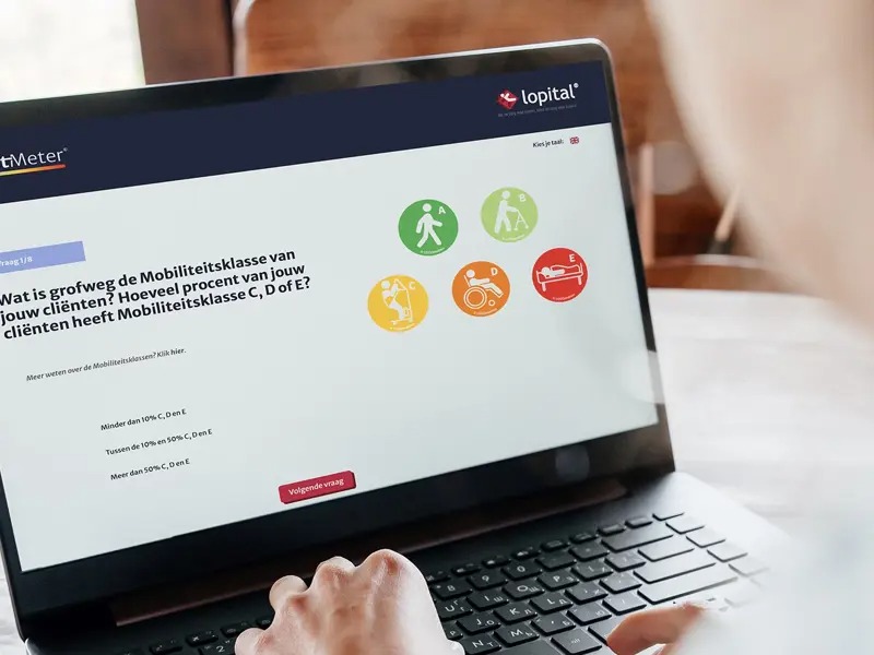 Modern blue shower stretcher with adjustable backrest and support handles on a white background.