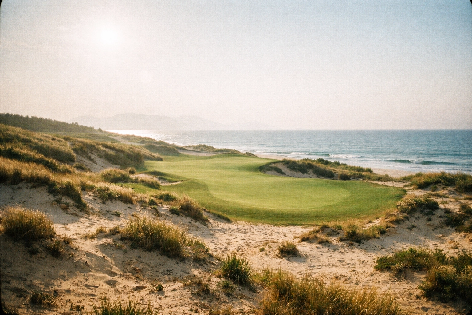Links-style fairways and coastal dunes at Hoiana Shores Golf Club in Vietnam.